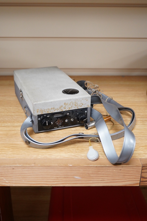 A late 1950s portable 9v battery powered reel-to-reel FI-Cord 1A, ‘Fidelity Recording’, as used by BBC reporters, with original vinyl strap and earphone
